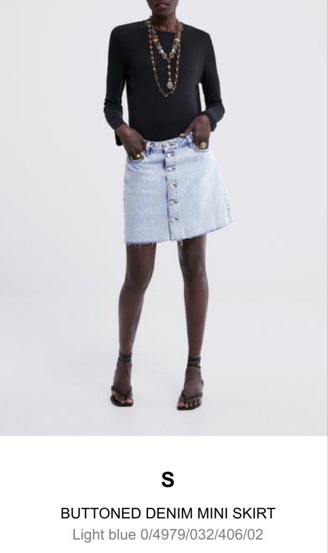 Zara Buttoned Denim Mini Skirt Light Blue (Category: Skirts) located in Calamba. Submitted by cheriiv (Listing ID 1469838163, Image 1). Description: Washed, never worn - Brand: Zara - Size: Small (S) - Color: Light blue denim - Style: Button-front mini skirt with metal hardware and front pockets - Detail: Trendy raw frayed hemline - Condition: Great everyday wardrobe staple, easy to style with tees or sweaters.