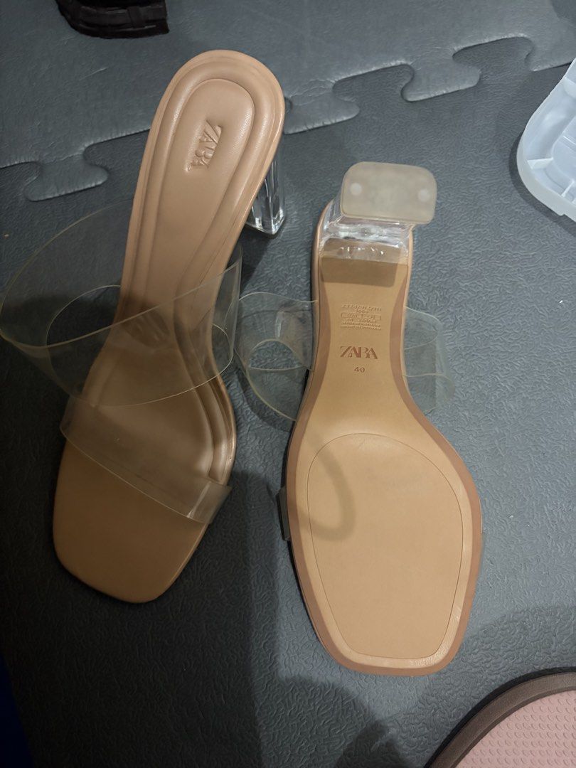 Zara Clear Strap Block Heels Size 40 Nude (Category: Heels) located in Manila. Submitted by viadinamama143 (Listing ID 1469811766, Image 1). Description: - Brand: Zara - Style: Nude block heels with clear transparent straps and square toe - Size: EUR 40 - Condition: Brand new, never worn, with tag attached - Versatile neutral shade that goes with any outfit.
