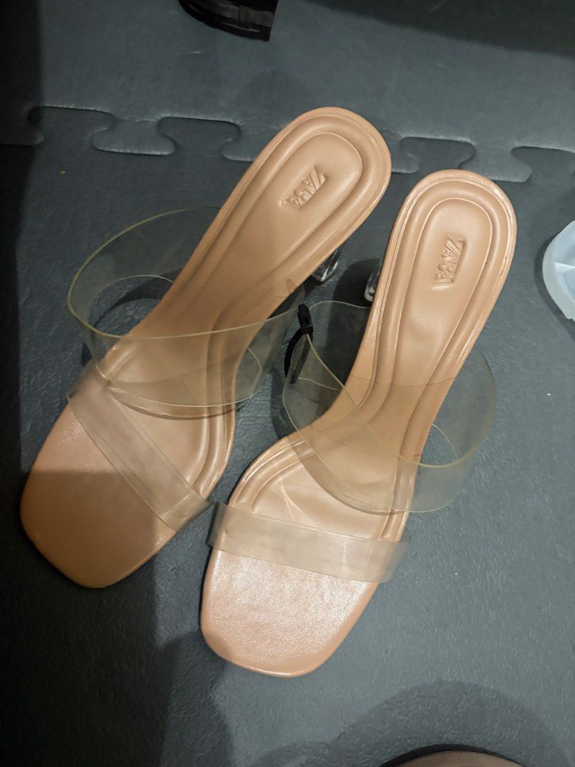 Zara Clear Strap Block Heels Size 40 Nude (Category: Heels) located in Manila. Submitted by viadinamama143 (Listing ID 1469811766, Image 3). Description: - Brand: Zara - Style: Nude block heels with clear transparent straps and square toe - Size: EUR 40 - Condition: Brand new, never worn, with tag attached - Versatile neutral shade that goes with any outfit.