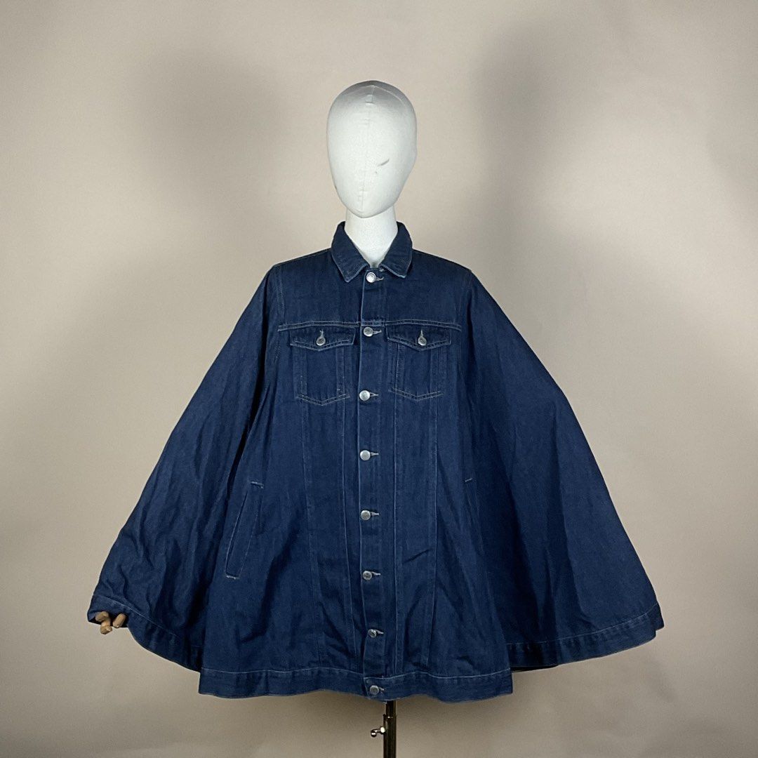 Zara Denim Cape Jacket (Category: Coats, Jackets and Outerwear) located in La Trinidad. Submitted by di_tiyak (Listing ID 1469776348, Image 3). Description: - Brand: Zara - Size: S - Color: Dark blue denim - Design: Button-up front, chest flap pockets, side pockets, and open arm slits for a unique draped look - Details: Heavy material with contrast stitching - Condition: Brand new with tag.