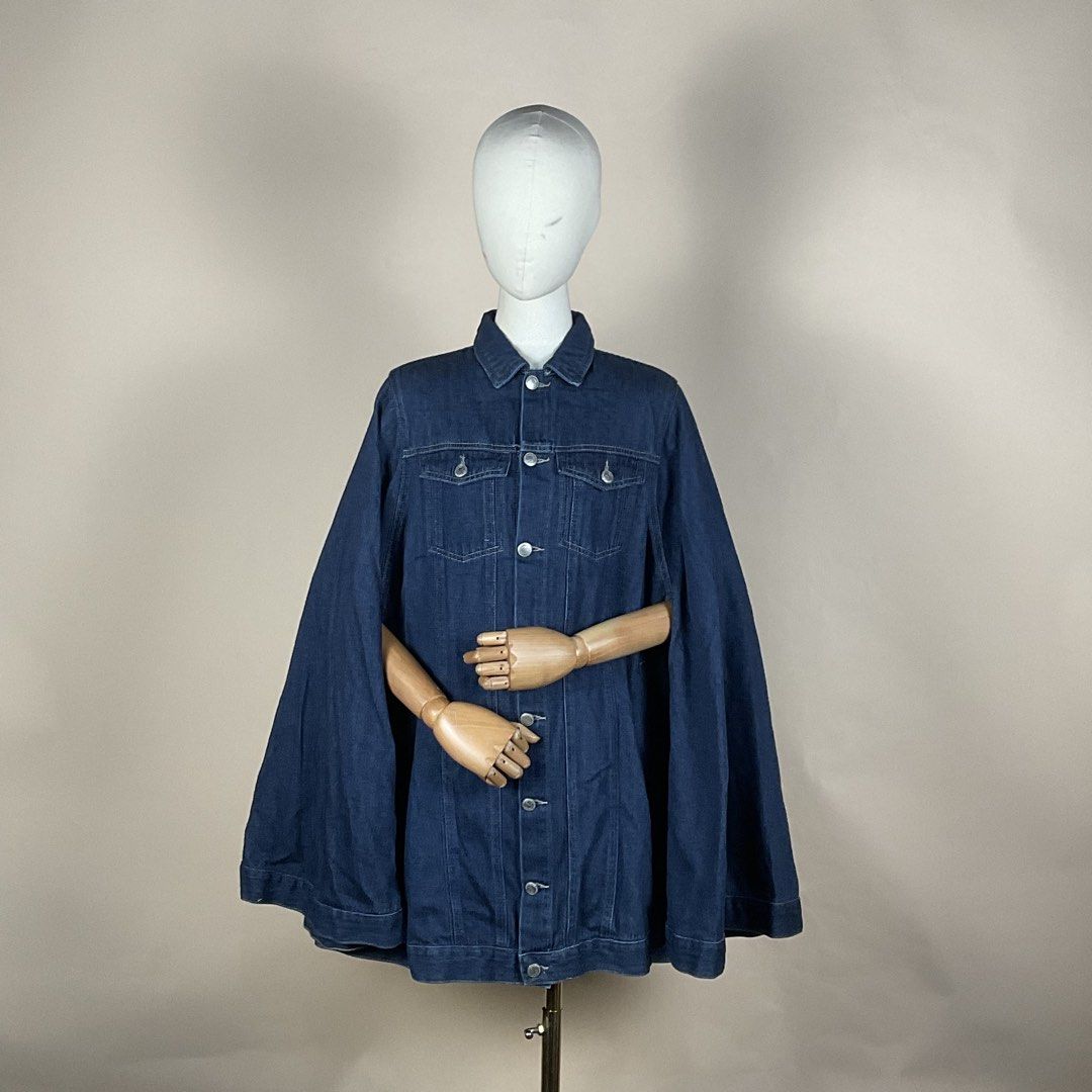 Zara Denim Cape Jacket (Category: Coats, Jackets and Outerwear) located in La Trinidad. Submitted by di_tiyak (Listing ID 1469776348, Image 2). Description: - Brand: Zara - Size: S - Color: Dark blue denim - Design: Button-up front, chest flap pockets, side pockets, and open arm slits for a unique draped look - Details: Heavy material with contrast stitching - Condition: Brand new with tag.