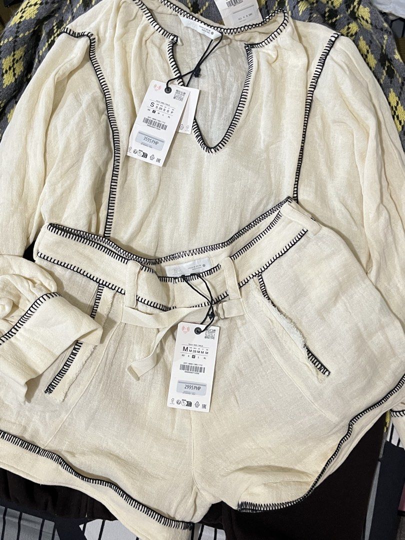 Zara Ecru Rustic Topstitching Coords Set | Flared Shorts and Comfy Top (Category: Sets or Coordinates) located in Taguig. Submitted by madeasoncloset (Listing ID 1469825944, Image 1). Description: Elegant & Comfy Set 🤎✨ Bought for ₱6,595, selling for only ₱3,595! Classy, elegant, and super comfy loose top with matching shorts. Perfect for that effortless sosyal look! 😍 ✨ Shorts: Size M (waist 29–30) Flare design na nakakaliit tingnan ng thighs 
