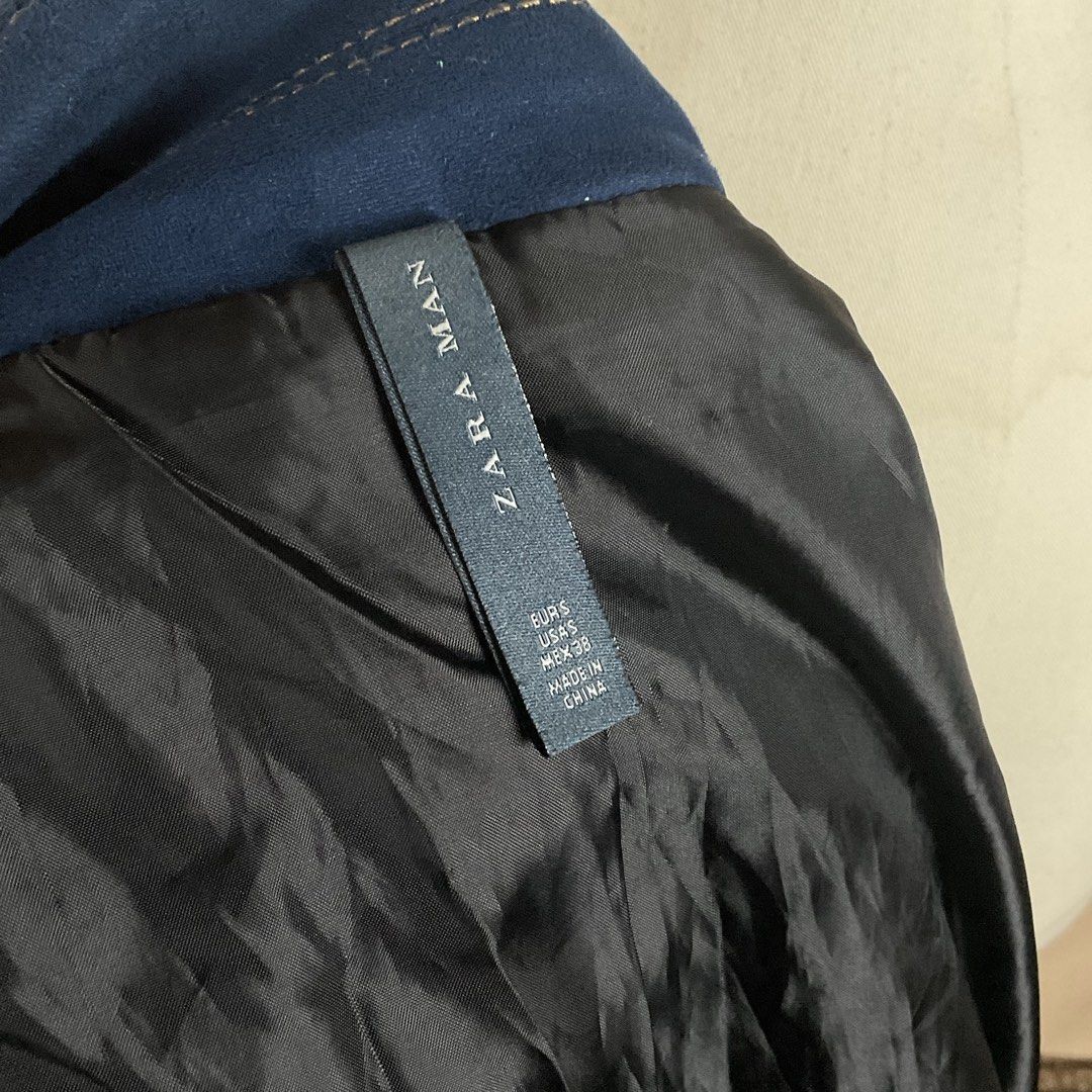 Zara Man Blue Denim Jacket Size S (Category: Coats, Jackets and Outerwear) located in La Trinidad. Submitted by di_tiyak (Listing ID 1469776346, Image 3). Description: - Brand/Model: Zara Man Denim Jacket - Size: EUR S / USA S / MEX 38 - Design: Metal front and chest pocket buttons with stylish contrast stitching - Interior: Dark blue lining with functional inner pockets - Condition: Good overall, clean, and ready to wear.