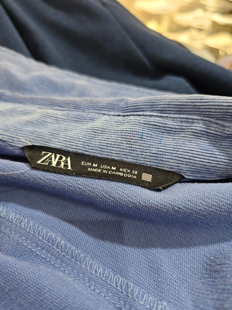 Zara Man Sky Blue Corduroy Button-Down Shirt (Category: Coats, Jackets and Outerwear) located in Baguio. Submitted by kayeonlineshop (Listing ID 1469817850, Image 2). Description: Zara Man Sky Blue Corduroy Button-Down Shirt. It is designed with a lightweight, soft corduroy texture, button cuffs, and a single matching patch pocket on the left chest..
