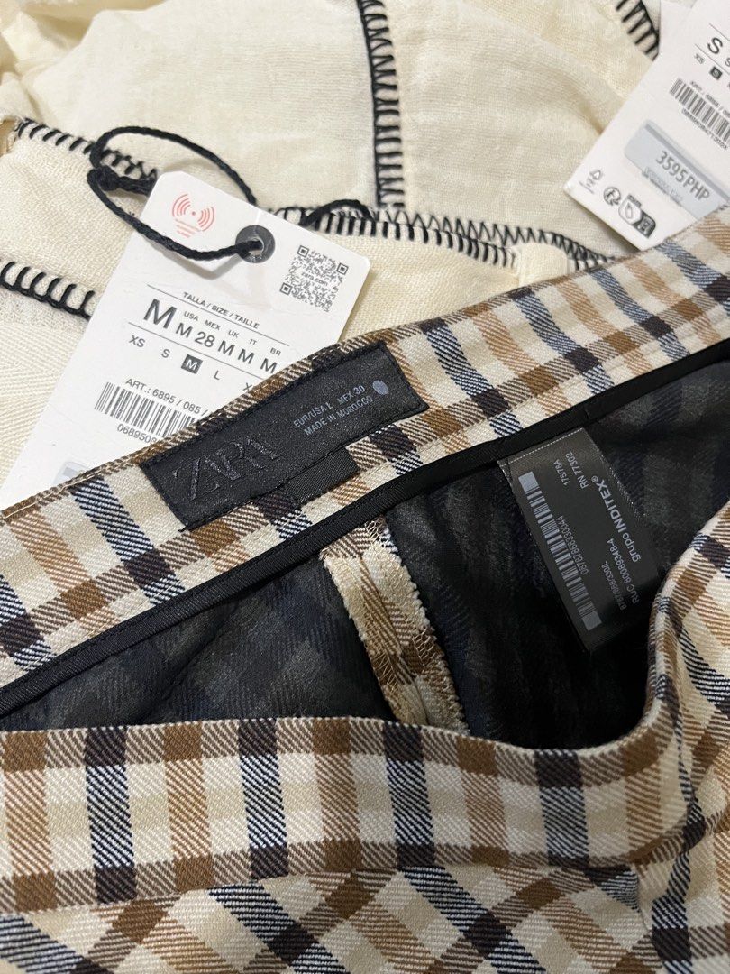 Zara Plaid Cape Midi Skirt (Category: Other Bottoms) located in Taguig. Submitted by madeasoncloset (Listing ID 1469839757, Image 2). Description: Super SHALA in person! 😍✨ Bought for ₱4,995 (almost 5K!) 😳 Super new pa! ❤️ Worn only once for an event. Size L — fits 29–30 waistline. Too big na for me since I lost weight. 🥹💕 Such a gorgeous piece! Perfect for your upcoming events. ✨.