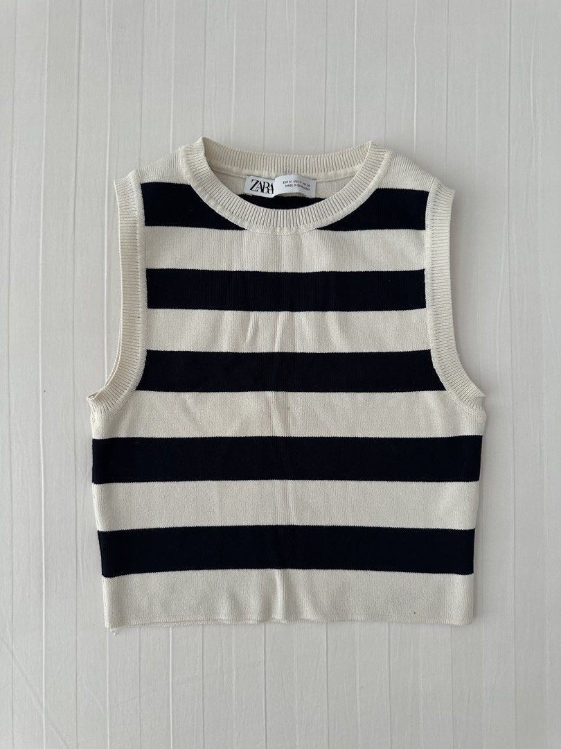 Zara Striped Knit Tank Top Medium (Category: Sleeveless) located in Manila. Submitted by denise805 (Listing ID 1469886340, Image 1). Description: - Brand: Zara - Style: Black and white striped knit tank top, crew neck, sleeveless, cropped length - Details: Ribbed trim at collar and armholes, soft knit fabric - Size: Medium (M) - Origin: Made in Bangladesh - Condition: Excellent, ready to wear.