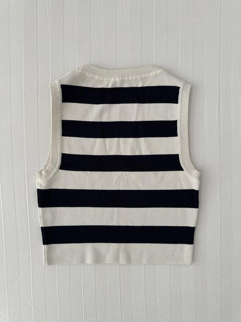 Zara Striped Knit Tank Top Medium (Category: Sleeveless) located in Manila. Submitted by denise805 (Listing ID 1469886340, Image 2). Description: - Brand: Zara - Style: Black and white striped knit tank top, crew neck, sleeveless, cropped length - Details: Ribbed trim at collar and armholes, soft knit fabric - Size: Medium (M) - Origin: Made in Bangladesh - Condition: Excellent, ready to wear.