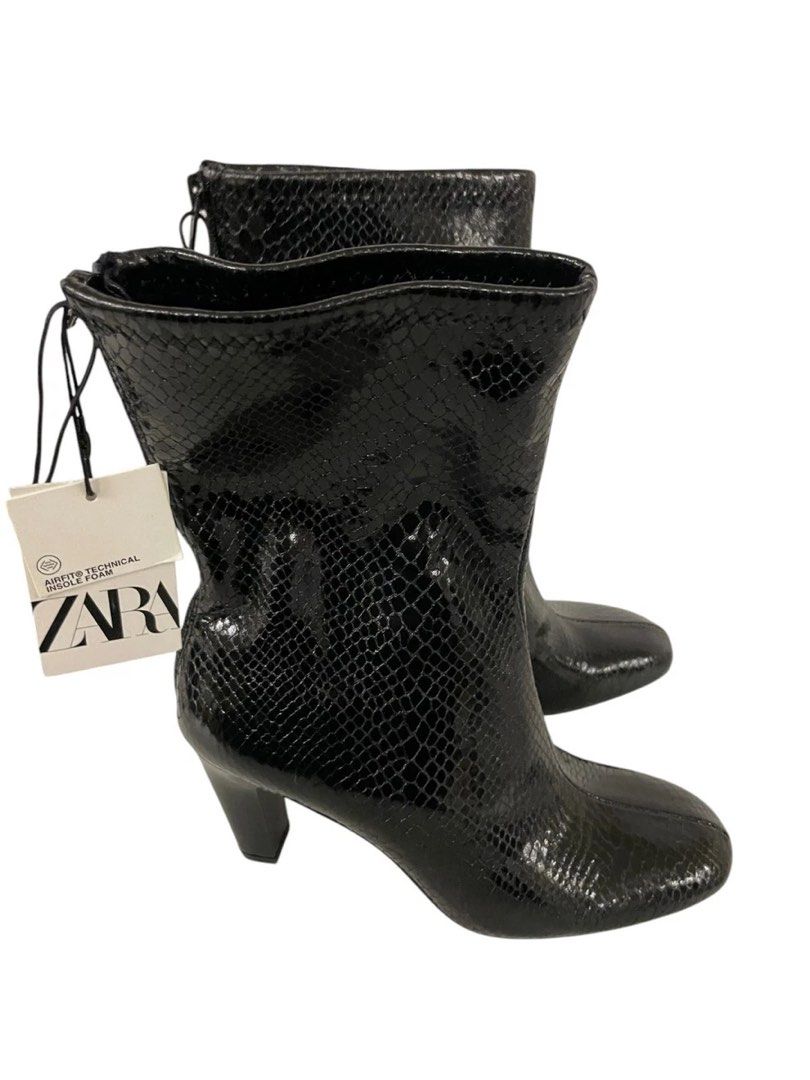 Zara textured boots (Category: Boots) located in Bulacan. Submitted by betterbuysmanila (Listing ID 1469761591, Image 1). Description: Fixed price Never worn Eu42 Fits 9-10W if wide.