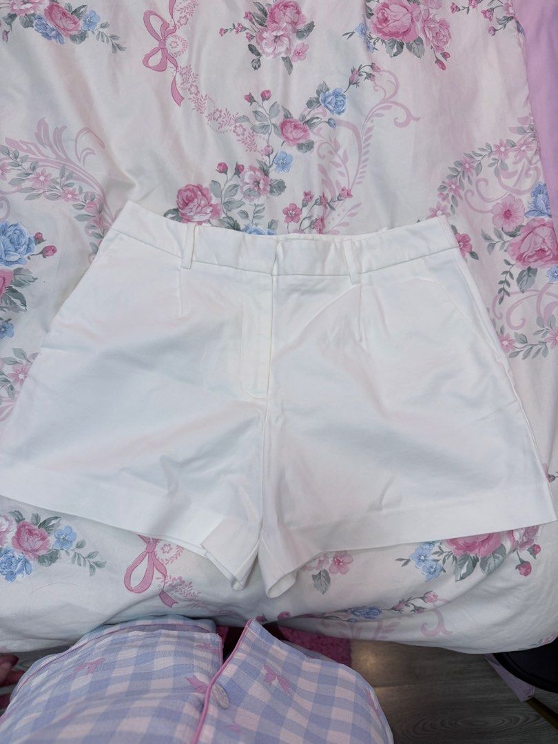Zara White Tailored Shorts Size M (Category: Shorts) located in Manila. Submitted by ponyoandsosuke (Listing ID 1469945082, Image 1). Description: - Brand: Zara - Color: Solid White - Size: Medium (fits true to size) - Rise: Mid-rise with belt loops - Details: Front pleats and back pocket welt details - Condition: Brand new / Excellent - Styling: Clean, versatile look perfect for pairing with crop tops or blouses - Origin: Made in China Bought in