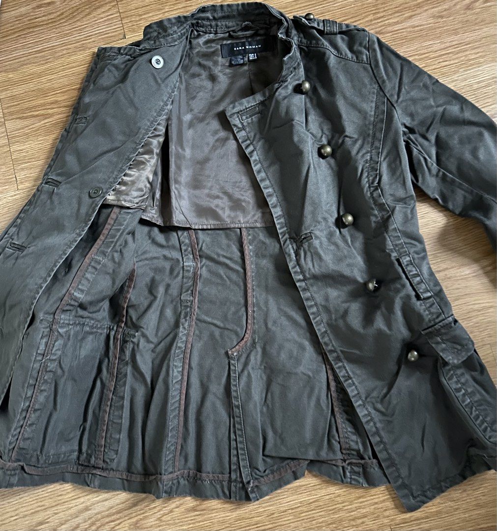 Zara Woman Jacket Size S (Category: Coats, Jackets and Outerwear) located in Mandaluyong City. Submitted by unworntobarelyworn (Listing ID 1469864385, Image 3). Description: - Brand: Zara Woman - Color: Dark green - Size: S; length: 27in ; width/chest: 30in - Details: Double-breasted brass-tone metal buttons, front utility pockets with flaps, structuring seams with center vent - Condition: 9/10 Pre loved .