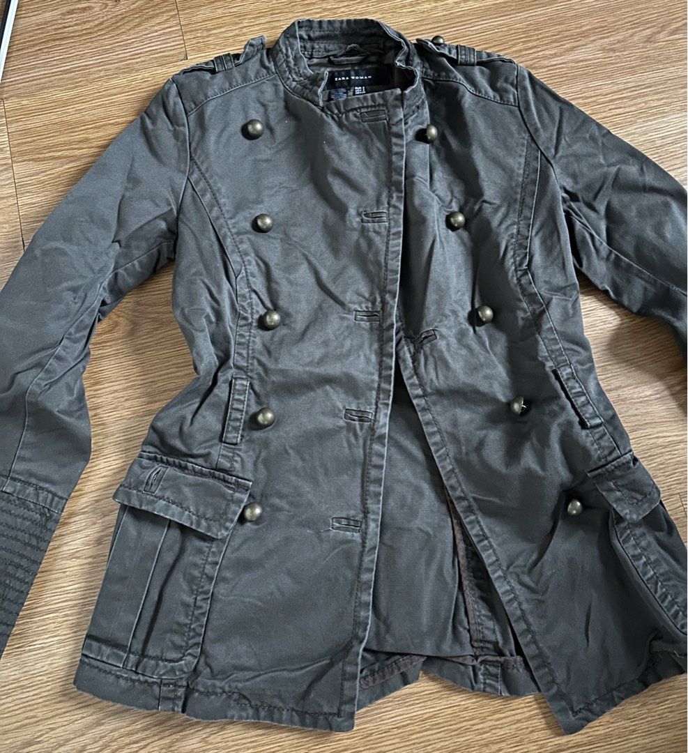 Zara Woman Jacket Size S (Category: Coats, Jackets and Outerwear) located in Mandaluyong City. Submitted by unworntobarelyworn (Listing ID 1469864385, Image 1). Description: - Brand: Zara Woman - Color: Dark green - Size: S; length: 27in ; width/chest: 30in - Details: Double-breasted brass-tone metal buttons, front utility pockets with flaps, structuring seams with center vent - Condition: 9/10 Pre loved .