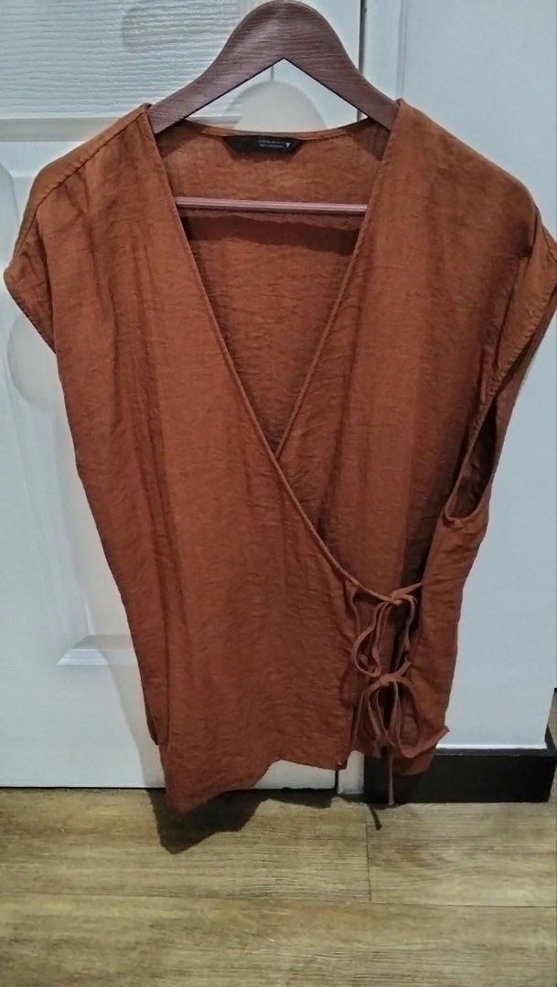 Zara wrap top (Category: Blouses) located in Manila. Submitted by mcl014. (Listing ID 1469912339, Image 1). Description: .