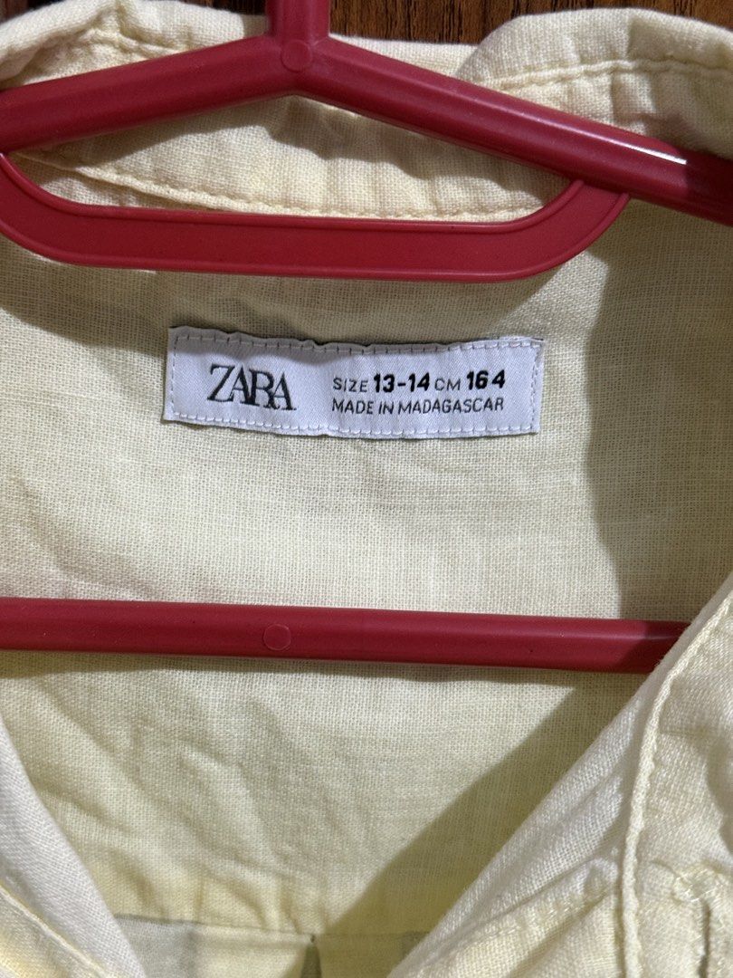 Zara yellow button up / polo (Category: Blouses) located in Adams. Submitted by adrchive (Listing ID 1469879917, Image 2). Description: - worn a few times lang - wrinkled due to folding Rfs: hindi na nasusuot.