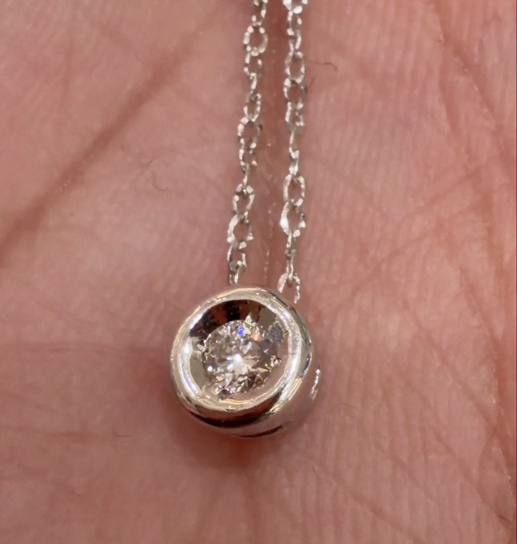 14K White Gold Bezel-set Diamond Necklace (Category: Necklaces) located in Las Pinas. Submitted by houseofgems0 (Listing ID 1470090990, Image 3). Description: 14K White Gold Bezel-set Diamond Necklace Details: - 14K White Gold | 1.5 grams - Size: 17 - 1 round brilliant-cut natural diamond - Total Carat Weight: .15ct - PRICE: ₱15,000 💎 All items are 100% AUTHENTIC/PAWNABLE. 💎 LAYAWAY AVAILABLE 4 months no interest. Send us a message to inquire..
