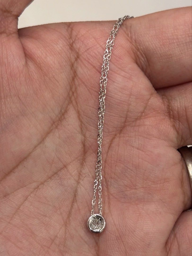 14K White Gold Bezel-set Diamond Necklace (Category: Necklaces) located in Las Pinas. Submitted by houseofgems0 (Listing ID 1470090990, Image 2). Description: 14K White Gold Bezel-set Diamond Necklace Details: - 14K White Gold | 1.5 grams - Size: 17 - 1 round brilliant-cut natural diamond - Total Carat Weight: .15ct - PRICE: ₱15,000 💎 All items are 100% AUTHENTIC/PAWNABLE. 💎 LAYAWAY AVAILABLE 4 months no interest. Send us a message to inquire..