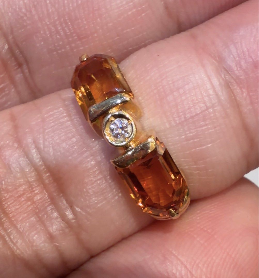 18K Yellow Gold Citrine and Diamond Ring (Category: Rings) located in Las Pinas. Submitted by houseofgems0 (Listing ID 1470090469, Image 3). Description: 18K Yellow Gold Citrine and Diamond Ring Details: - 18K Yellow Gold | 2.8 grams - Size: 5 - 1 round brilliant-cut natural diamond - 2 fancy-cut natural citrine - Total Carat Weight (dia): .03ct stamped - Total Carat Weight (citrine): .40ct - PRICE: ₱22,000 💎 All items are 100% AUTHENTIC/PAWNABL