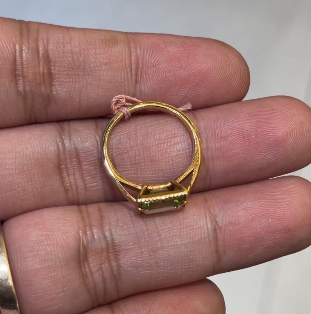 18K Yellow Gold Peridot Ring (Category: Rings) located in Las Pinas. Submitted by houseofgems0 (Listing ID 1470089977, Image 2). Description: 18K Yellow Gold Peridot Ring Details: - 18K Yellow Gold | 3 grams - Size: 6 - 1 emerald-cut natural peridot - Total Carat Weight: 1.5ct stamped - PRICE: ₱22,000 💎 All items are 100% AUTHENTIC/PAWNABLE. 💎 LAYAWAY AVAILABLE Send us a message to inquire..