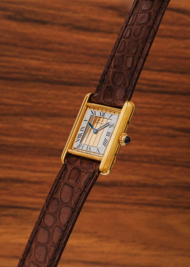 1990s Must de Cartier Tank "Trinity Dial" (Category: Women's Watches) located in Manila. Submitted by windsorfinery (Listing ID 1470088876, Image 3). Description: Must de Cartier Tank 557051 1990s Quartz 21mm Vermeil (925 sterling silver wrapped in gold plating) Mineral Aftermarket strap with Cartier buckle Box: No Papers: No Others: Leather pouch. 1-Year Mechanical Warranty by Windsor Finery Co. Cash Price: ₱128,000 ✔️ Layaway accepted ✔️ Credit