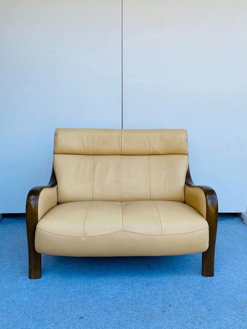 2-Seater Leather Sofa (Category: Sofas) located in Manila. Submitted by elliefurnies31 (Listing ID 1470090004, Image 2). Description: "JAPAN SURPLUS" "DIRETTORE" LEATHER SOFA WITH WOODEN CURVED ACCENT SIZE: 42L" x 25W" x 15Sh" x 34H" inches (AS-IS ITEM) IN GOOD CONDITION.