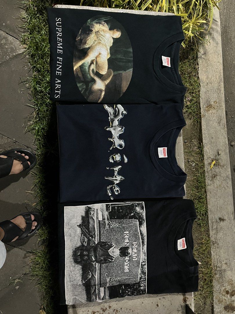 3 Supreme Tees (Category: Tshirts & Polo Shirts ) located in Manila. Submitted by sayd-thrift (Listing ID 1470106153, Image 1). Description: Supreme Liquid metal (₱1500) Excellent Condition no flaws no exact dimes Large on tag Supreme Fine Arts (₱1700) Excellent Condition Hairline (sign of vintage) Large on tag Supreme Kennedy’s (₱1999) Excellent to as new minimal hairline (sign of vintage) Large on tag ₱4500 aspack, sf not included .