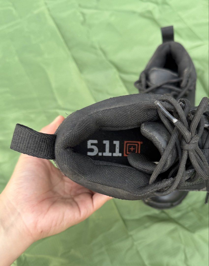 5.11 Tactical Black Duty Boots (Category: Boots) located in Cavite. Submitted by maxs.bl (Listing ID 1469955571, Image 3). Description: - Brand/Model: 5.11 Tactical Boots - Color: Classic Black - Condition: Pre-owned with minor scuffs and dust marks from previous wear; structurally solid - Features: Sturdy construction, traditional lacing system, and heel pull loop for easy slip-on - Outsole: Durable rubber built for rough terrain - Best For: Law