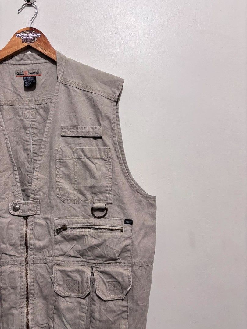 5.11 Tactical Vest (Category: Coats, Jackets and Outerwear) located in Bauan. Submitted by onetwothrift2 (Listing ID 1469954648, Image 3). Description: 5.11 Tactical Vest (Multiple Pockets) Size: XL- 2XL Dimes: L29 W26 Color rate: 10/10 Excellent condition No issue.