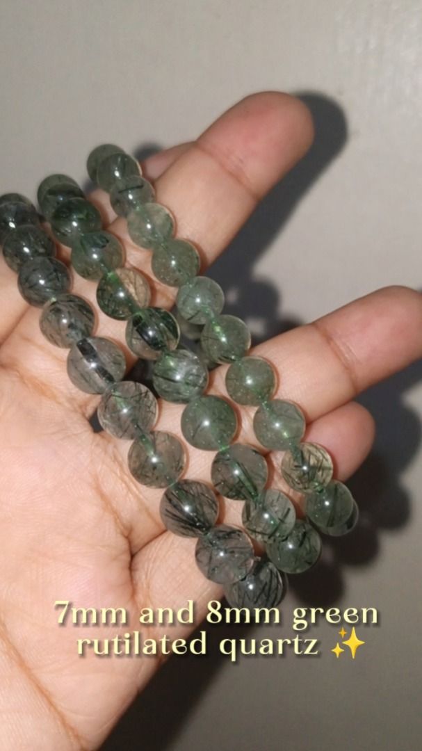 7-8mm Green rutilated quartz (Category: Bracelets) located in Reina Mercedes. Submitted by tamaracrystals_27 (Listing ID 1470001265, Image 3). Description: Metaphysical & Emotional Benefits • Heart Chakra Alignment: open emotional communication, foster empathy, and support heart healing. • Wealth & Career Growth: Often called a stone of steady growth and abundance, it is used as a talisman to attract financial opportunities, navigate complex busi