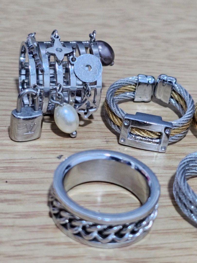 8 pcs. Rings Bundle Set (Category: Rings) located in Caloocan City. Submitted by smart_shoppers_ville (Listing ID 1469970971, Image 2). Description: - Stunning collection of cable wire rings in various designs and finishes - Includes silver, gold, and two-tone combinations with stainless steel accents - Features charms, pearl dangle details, and structural rectangular stations - Great variety of styles, perfect for stacking or wearing individuall