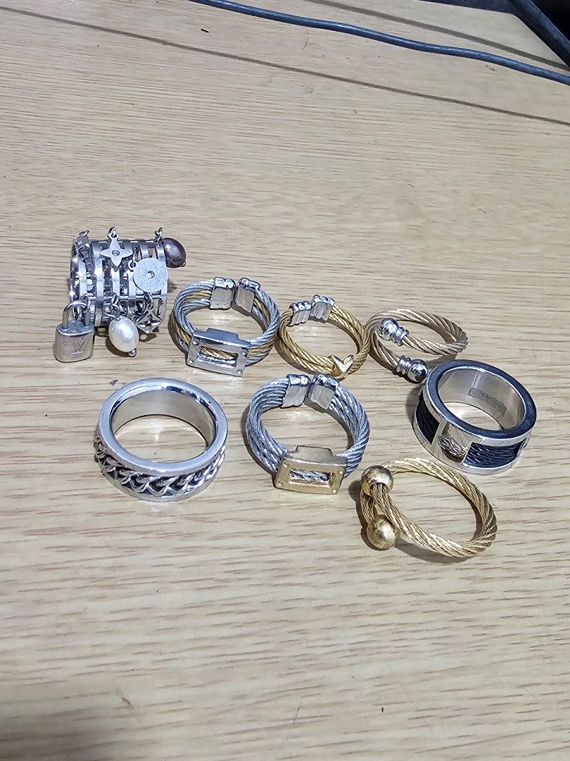8 pcs. Rings Bundle Set (Category: Rings) located in Caloocan City. Submitted by smart_shoppers_ville (Listing ID 1469970971, Image 1). Description: - Stunning collection of cable wire rings in various designs and finishes - Includes silver, gold, and two-tone combinations with stainless steel accents - Features charms, pearl dangle details, and structural rectangular stations - Great variety of styles, perfect for stacking or wearing individuall