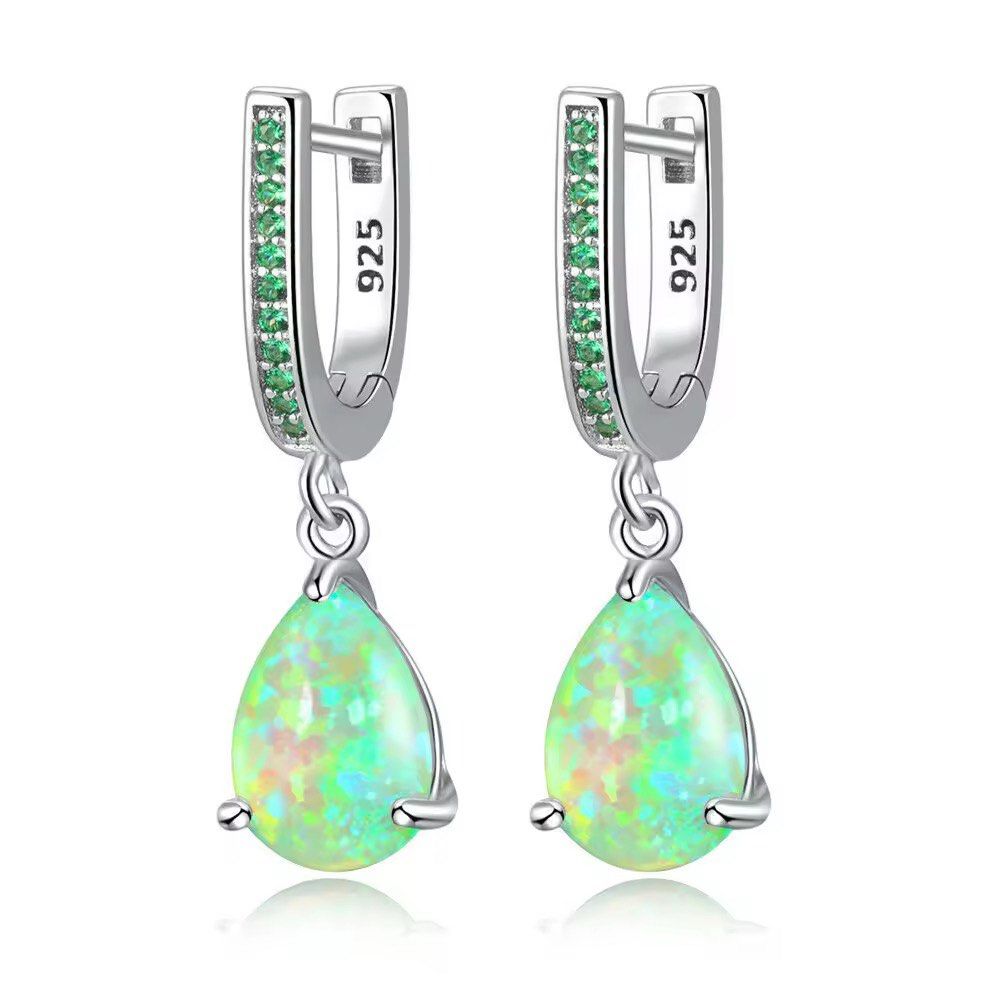 925 Silver Green Created Opal & Quartz Dangle Earrings (Category: Earrings) located in Manila. Submitted by hackelina (Listing ID 1470075616, Image 1). Description: - Material: Genuine Sterling Silver 925 - Main Stone: 10 x 8 mm pear-shaped created opal with vibrant green play-of-color - Accents: Sparkling 1 mm green quartz stones on the hoop - Dimensions: Total length of 27 mm - Weight: Lightweight at 2.52 grams - Closure: Secure leverback for a