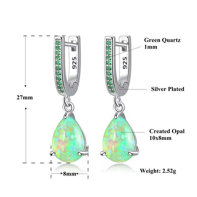 925 Silver Green Created Opal & Quartz Dangle Earrings (Category: Earrings) located in Manila. Submitted by hackelina (Listing ID 1470075616, Image 2). Description: - Material: Genuine Sterling Silver 925 - Main Stone: 10 x 8 mm pear-shaped created opal with vibrant green play-of-color - Accents: Sparkling 1 mm green quartz stones on the hoop - Dimensions: Total length of 27 mm - Weight: Lightweight at 2.52 grams - Closure: Secure leverback for a