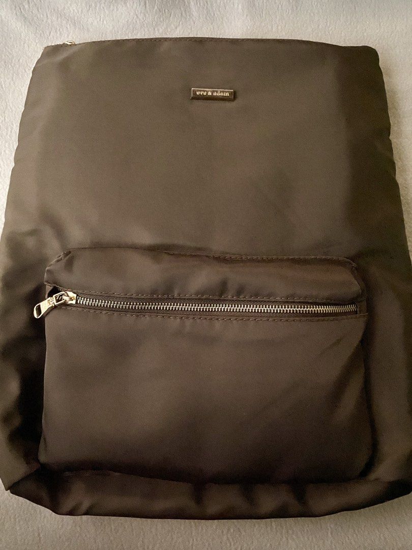 ✨Eve & Adam Nylon Travel Backpack (Dark Brown)✨ (Category: Backpacks) located in Quezon City. Submitted by thisismayi (Listing ID 1470072088, Image 1). Description: Details: • Color: Dark Brown / Espresso • Material: Lightweight, durable nylon with sturdy hardware • Features: Comfort able backpack straps, built-in luggage sleeve at the back to easily slip over trolley handles, and multiple inner/outer pockets for easy organization • Condition: Pr