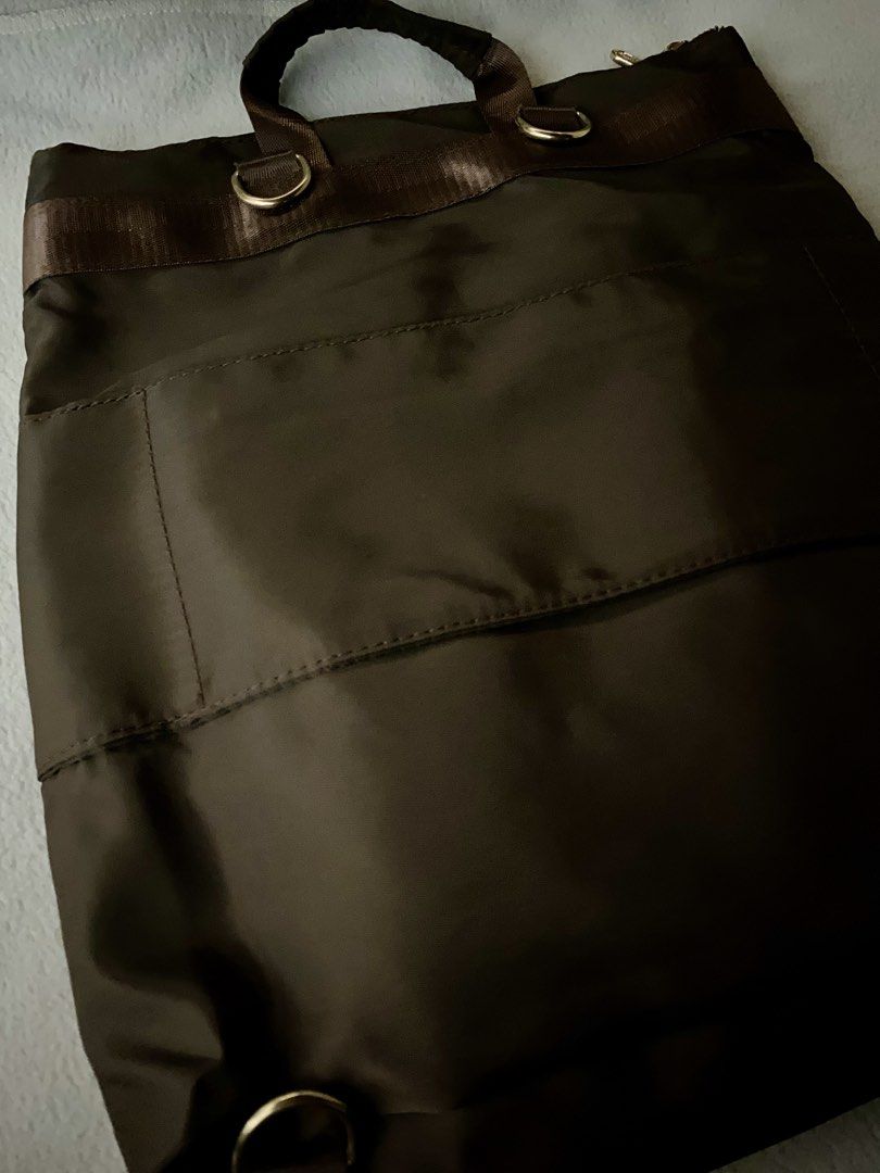✨Eve & Adam Nylon Travel Backpack (Dark Brown)✨ (Category: Backpacks) located in Quezon City. Submitted by thisismayi (Listing ID 1470072088, Image 2). Description: Details: • Color: Dark Brown / Espresso • Material: Lightweight, durable nylon with sturdy hardware • Features: Comfort able backpack straps, built-in luggage sleeve at the back to easily slip over trolley handles, and multiple inner/outer pockets for easy organization • Condition: Pr