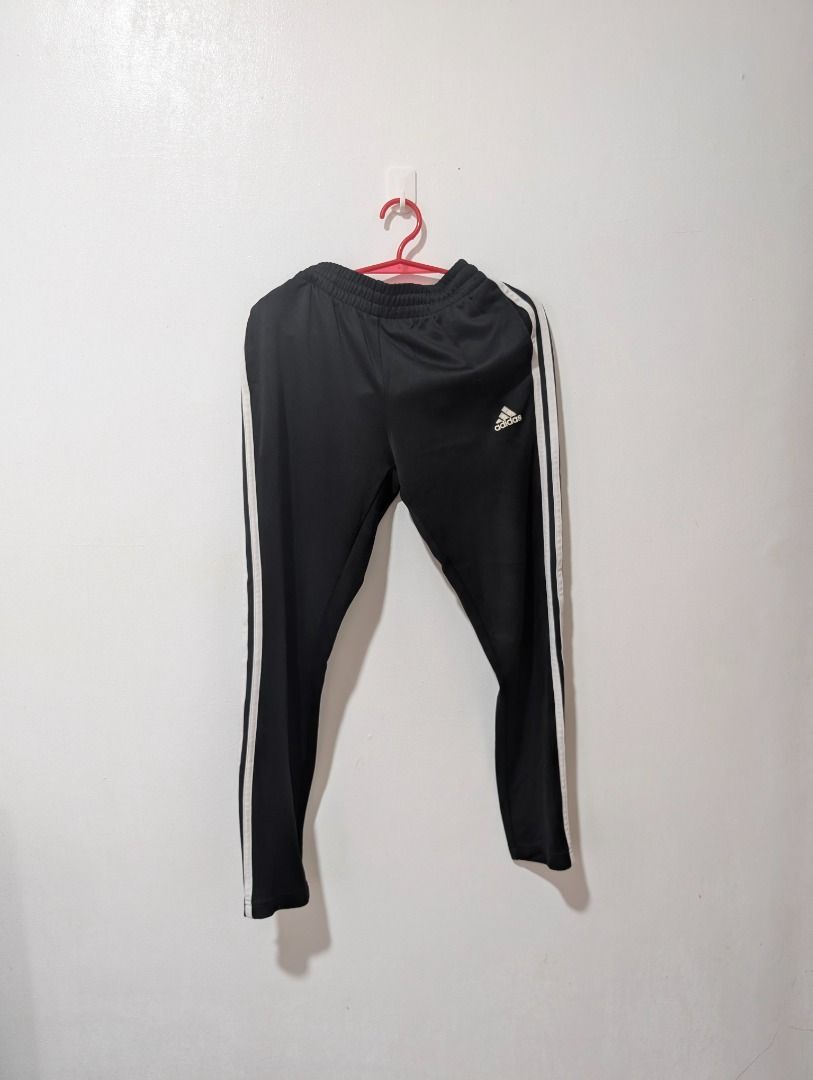 👖 Adidas Black Track Pants with White Stripes (Category: Joggers) located in Agdangan. Submitted by ej-declutter (Listing ID 1470016613, Image 1). Description: 📏 Size: Medium ↔️ Width: 23" 📐 Length: 29" ✨ Condition: Excellent Condition ⚠️ Issues/Defects: None.