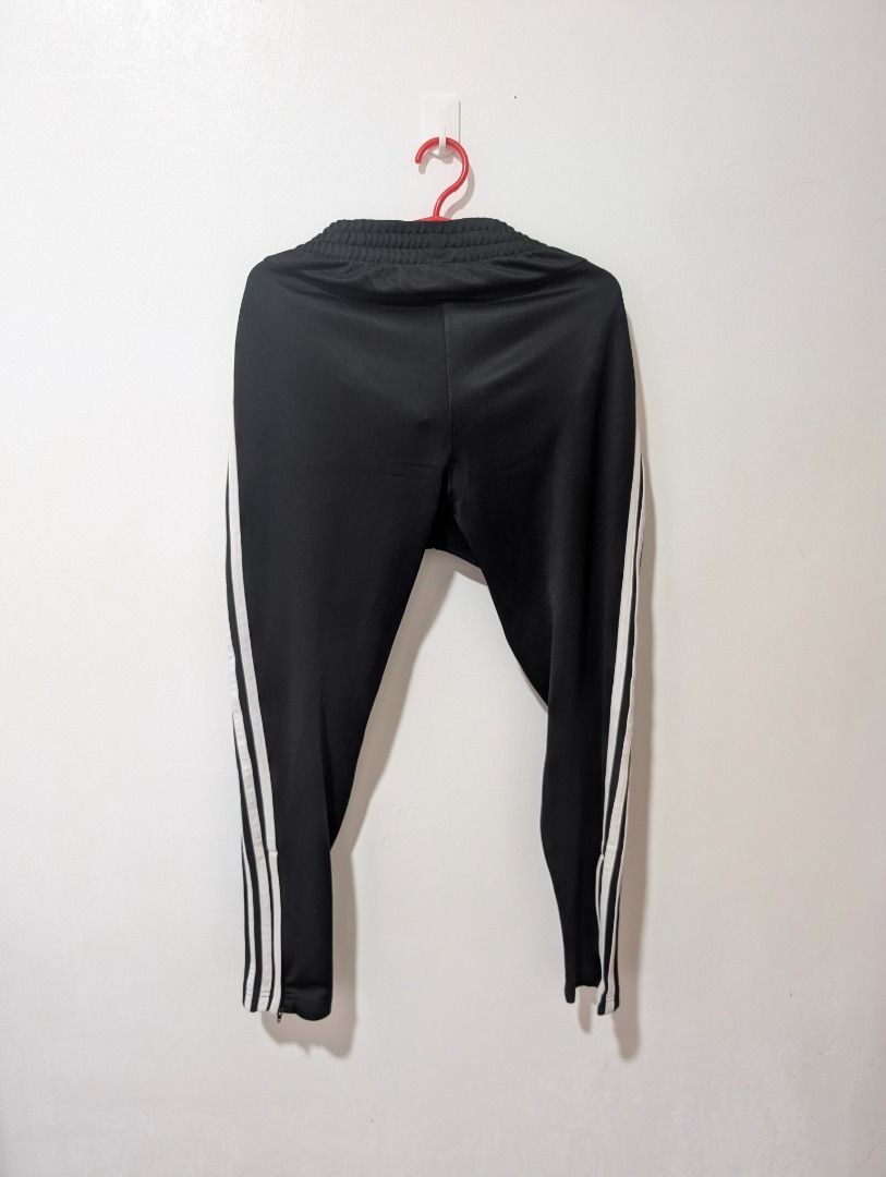 👖 Adidas Black Track Pants with White Stripes (Category: Joggers) located in Agdangan. Submitted by ej-declutter (Listing ID 1470016613, Image 2). Description: 📏 Size: Medium ↔️ Width: 23" 📐 Length: 29" ✨ Condition: Excellent Condition ⚠️ Issues/Defects: None.