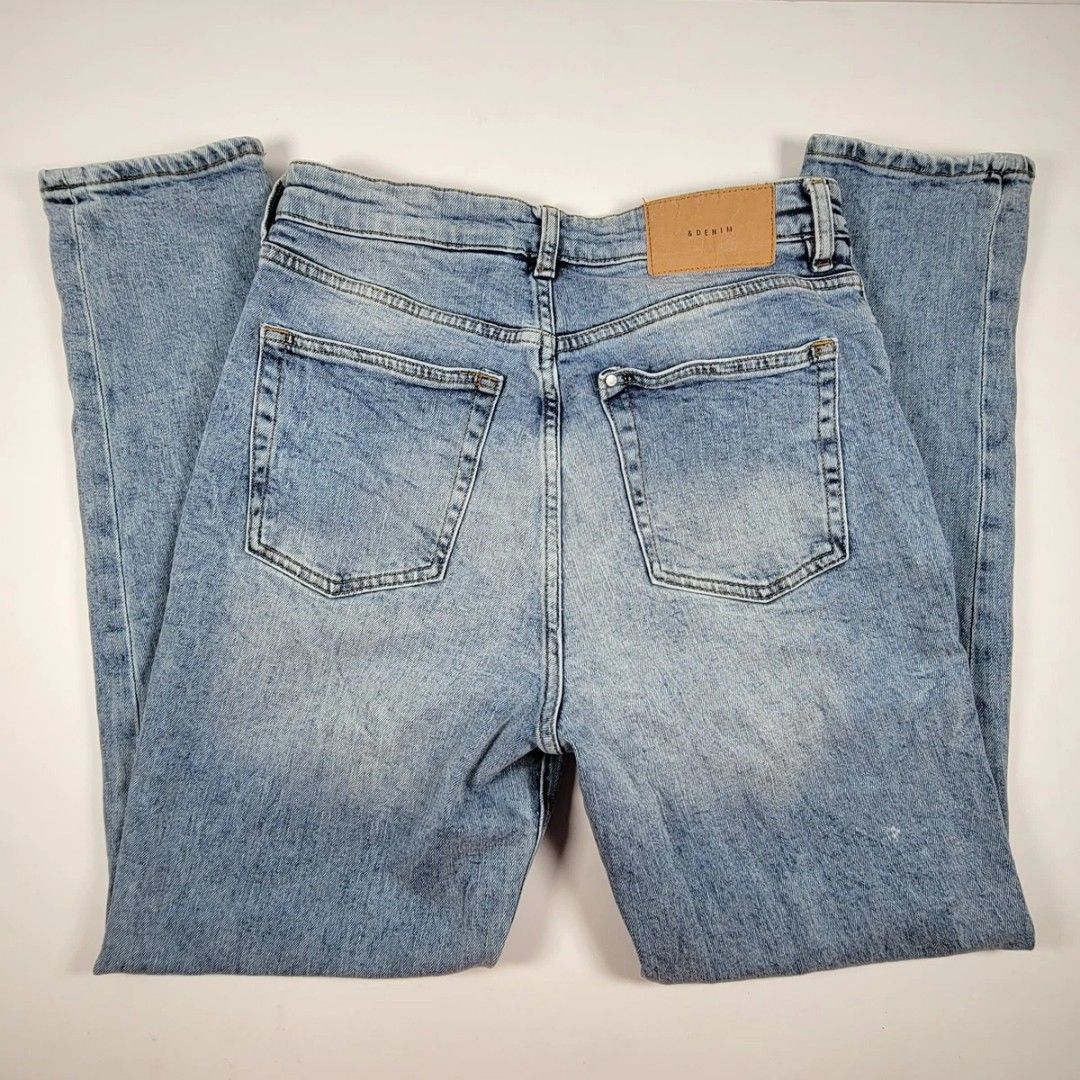 & Denim Light Wash Straight Leg Jeans (Category: Jeans) located in Lupao. Submitted by selahthriftedclothing (Listing ID 1470136560, Image 1). Description: - Brand: & Denim - Wash: Light / Acid wash with fading on thighs - Style: Classic five-pocket design - Closure: Button fly - Details: Tan leather brand patch on back waistband - Condition: Great casual everyday pants, easy to style with tees or sweaters.