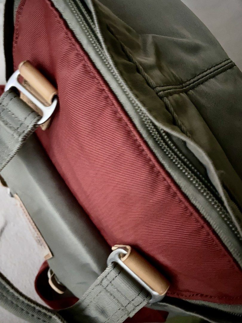 ✨ Doughnut Macaroon Mini Backpack (Wine / Burgundy)✨ (Category: Backpacks) located in Quezon City. Submitted by thisismayi (Listing ID 1470080287, Image 3). Description: Details: • Colorway: Wine & Grey with tan trim details • Features: Multi-pocket internal organizer, side bottle pockets, padded adjustable shoulder straps, and top handles with leather snap clasp • Condition: Pre-loved - overall in very good, clean condition with intact leather d