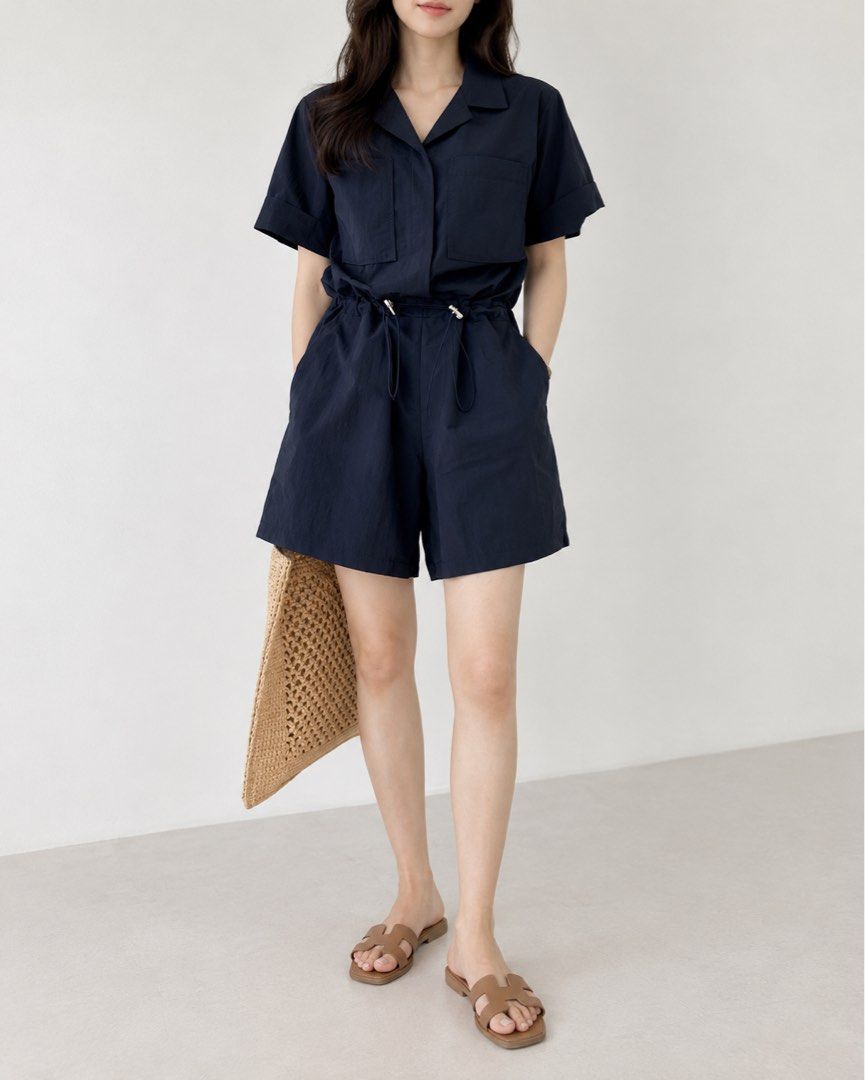 💙 Navy Blue Utility Romper | Short Sleeve | Drawstring Waist (Category: Rompers) located in Manila. Submitted by hellothere2012 (Listing ID 1470139767, Image 1). Description: A stylish navy blue short-sleeve romper with a collared neckline, button-front closure, and adjustable drawstring waist. Features two front patch pockets and a lightweight-looking, slightly crinkled fabric for a relaxed, casual style. ✨ Details * Color: Navy blue * Style: S
