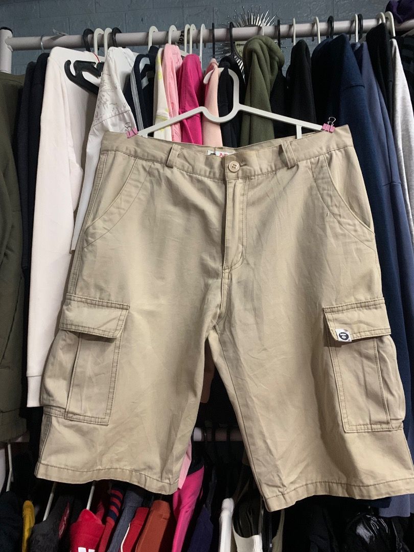 Aape By A Bathing Ape Beige Cargo Shorts (Category: Shorts) located in Gingoog City. Submitted by relux (Listing ID 1469988673, Image 3). Description: Authentic Aape By A Bathing Ape beige cargo shorts in a relaxed fit. Features multiple utility pockets and signature camo patches. Sturdy cotton fabric, great for daily streetwear. Inner labels intact..