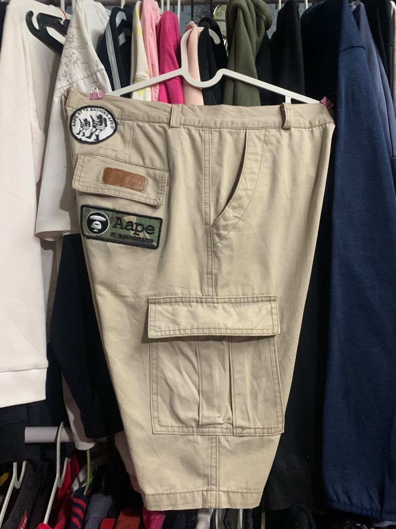 Aape By A Bathing Ape Beige Cargo Shorts (Category: Shorts) located in Gingoog City. Submitted by relux (Listing ID 1469988673, Image 1). Description: Authentic Aape By A Bathing Ape beige cargo shorts in a relaxed fit. Features multiple utility pockets and signature camo patches. Sturdy cotton fabric, great for daily streetwear. Inner labels intact..