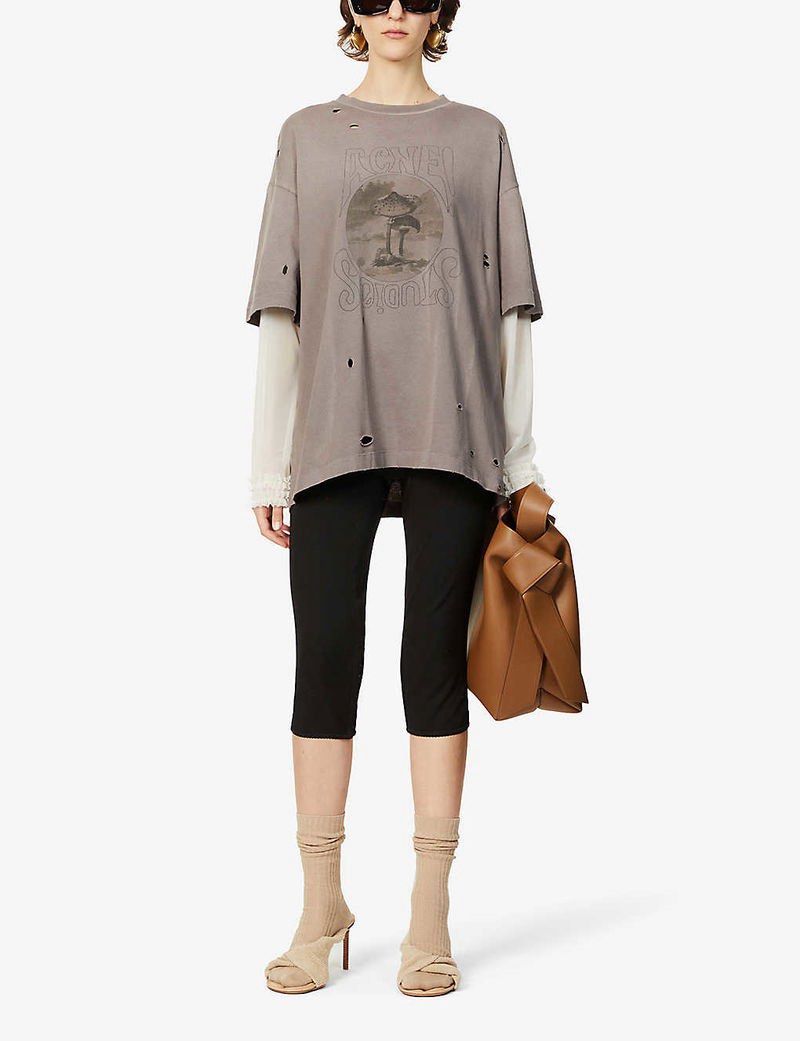 Acne Studios Edra Distressed T-Shirt (Category: Shirts) located in Quezon City. Submitted by dropdeadprices (Listing ID 1470042073, Image 2). Description: - Brand: Acne Studios (Edra model) - Color: Grey with attached white layered long sleeve - Details: Cool mushroom graphic with outlined lettering, intentional distressing, holes, and frayed edges - Fit: Oversized fit - Material: Comfortable cotton blend - Retail: Approx. £270 (₱20,000+) - Condi