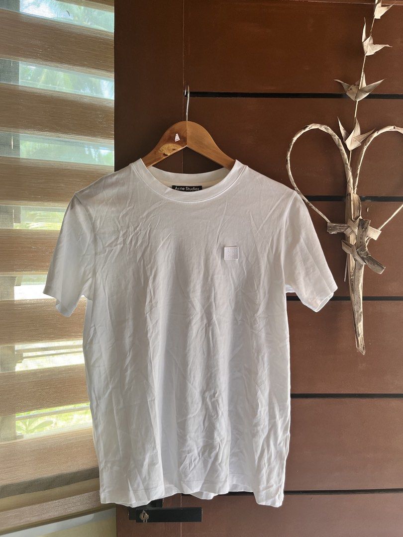 Acne Studios White Face Logo T-shirt (Category: Shirts) located in Tagum. Submitted by thisisdavethriftzzz (Listing ID 1470036874, Image 1). Description: Dimension⬇️ Width: 18 Length: 25 Issue: Cut washtag Color rate: ₱300.