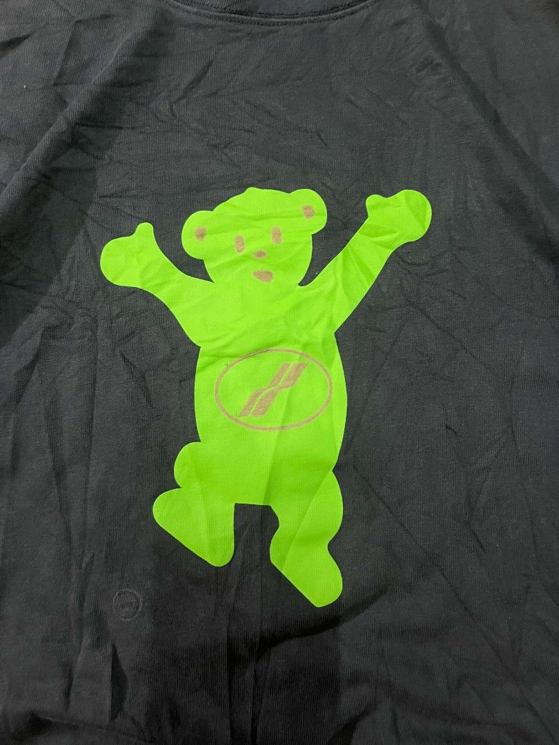 Ader Error Blue T-Shirt With Green Graphic (Category: Tshirts & Polo Shirts ) located in Ozamiz City. Submitted by tripft.vonde (Listing ID 1470048682, Image 2). Description: - Color: Dark blue with vibrant green contrast prints - Design: Front bear with brown details and logo; back bear with a center zipper design - Branding: Small black rubber patch with embossed logo near the hem - Fit & Feel: Casual streetwear fit made from soft, comfortable 