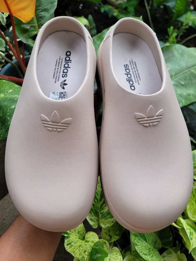 Adidas Adifom Stan Smith Mule Shoes (Category: Slippers and slides) located in Kabankalan. Submitted by stylesavy (Listing ID 1470000418, Image 2). Description: - Authentic Adidas Adifom Stan Smith mule shoes in trendy beige -size 9, 42 US - Convenient slip-on design with textured foam upper - Iconic debossed trefoil logo on the front - Stylish chunky platform sole featuring a circular tread pattern - Clean footbed with printed branding and origi