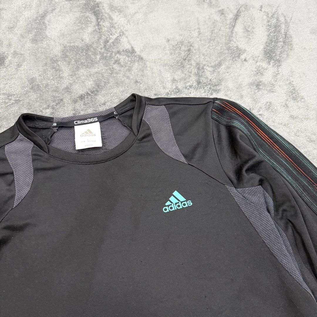 ADIDAS CLIMA365 LONG SLEEVE (Category: Activewear) located in Santa Maria. Submitted by rarefindslt (Listing ID 1470031852, Image 3). Description: ADIDAS CLIMA365 LONG SLEEVE (SWIPE LEFT FOR MORE DETAILS..) Size L on tag in solid good condition rate! complete tags for authenticity, solid black condition color rate, multicolor stripe on sleeve, side print script logo, can pass as new! no issue.