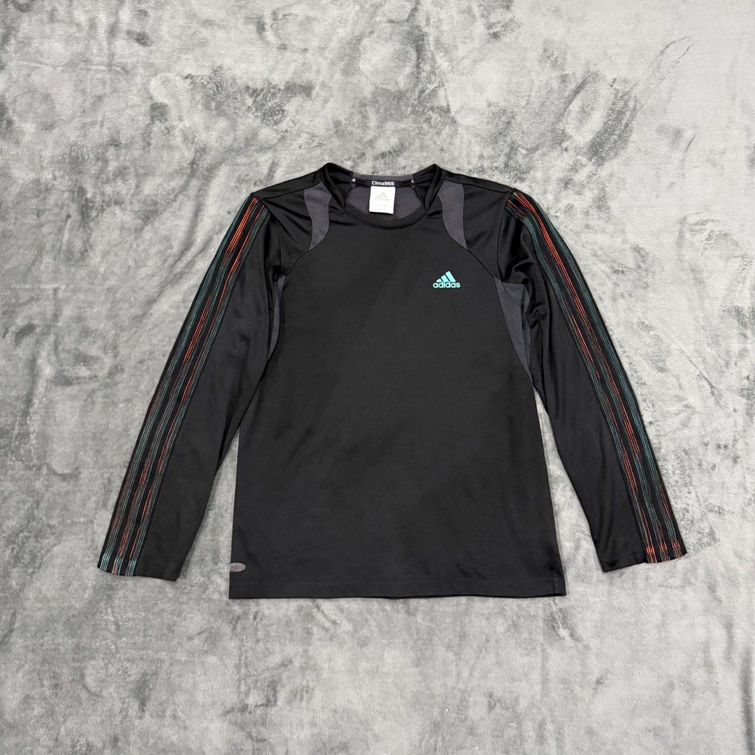 ADIDAS CLIMA365 LONG SLEEVE (Category: Activewear) located in Santa Maria. Submitted by rarefindslt (Listing ID 1470031852, Image 1). Description: ADIDAS CLIMA365 LONG SLEEVE (SWIPE LEFT FOR MORE DETAILS..) Size L on tag in solid good condition rate! complete tags for authenticity, solid black condition color rate, multicolor stripe on sleeve, side print script logo, can pass as new! no issue.