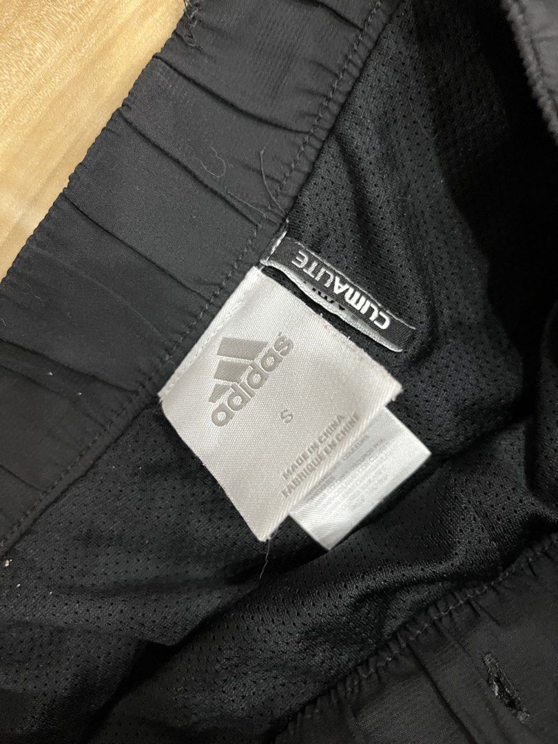 Adidas Track Pants (Category: Joggers) located in Angeles City. Submitted by thriftsij (Listing ID 1470045900, Image 2). Description: - Brand: Adidas -W28 (Adjustable) L38.5 LO9 (Adjustable) - Item: Track pants - Color: Black with red stripes - Size: Small - Features: Elastic waistband, interior mesh lining, Climalite technology - Pockets: Two secure zippered side pockets - Details: Embroidered red Adidas logo -issue no lace.