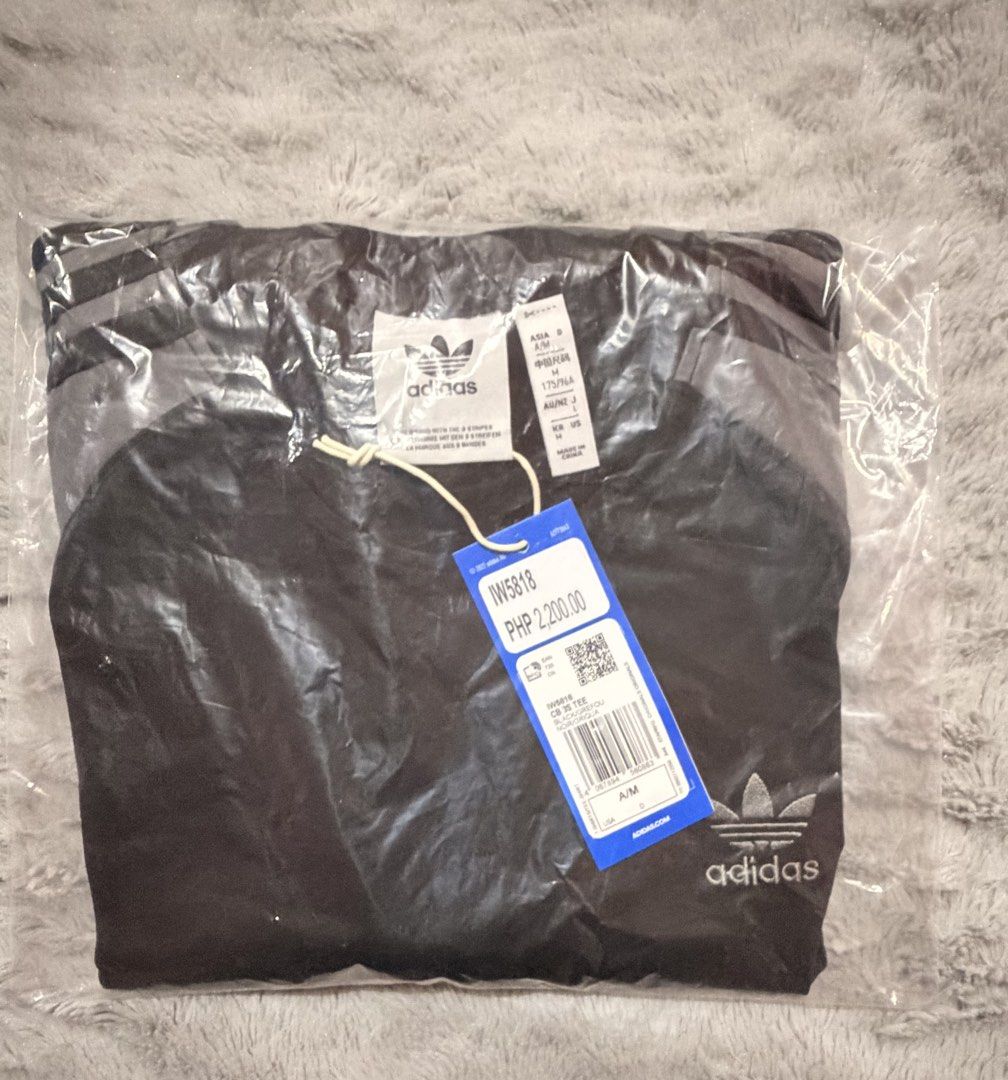 Adidas Colorblocked 3stripes Tee Men (Category: Tshirts & Polo Shirts ) located in Bulacan. Submitted by yandaime (Listing ID 1469950659, Image 2). Description: Adidas Colorblocked 3stripes Tee Men RFS: Decluttering Authentic - brandnew with tag SRP: 2,200 Selling Price: 1,300 Location: meycauayan bulacan.