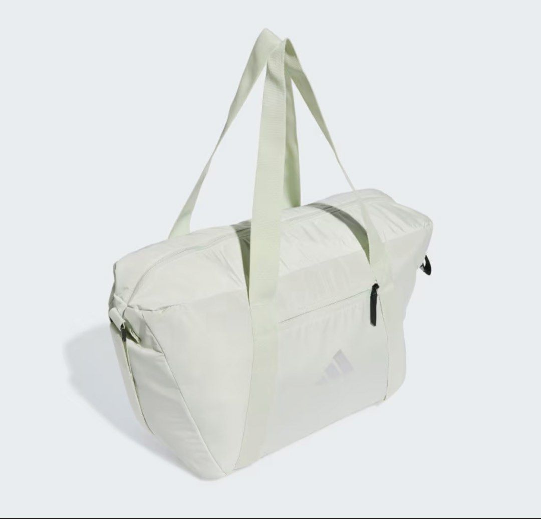Adidas Gym Training Bag (Category: Tote Bags) located in Muntinlupa City. Submitted by andsshop_ (Listing ID 1469981230, Image 3). Description: Mint green gym / training bag. Fits a lot!!! All zippers working and in good condition. Bought on sale for 1,700-1,800.