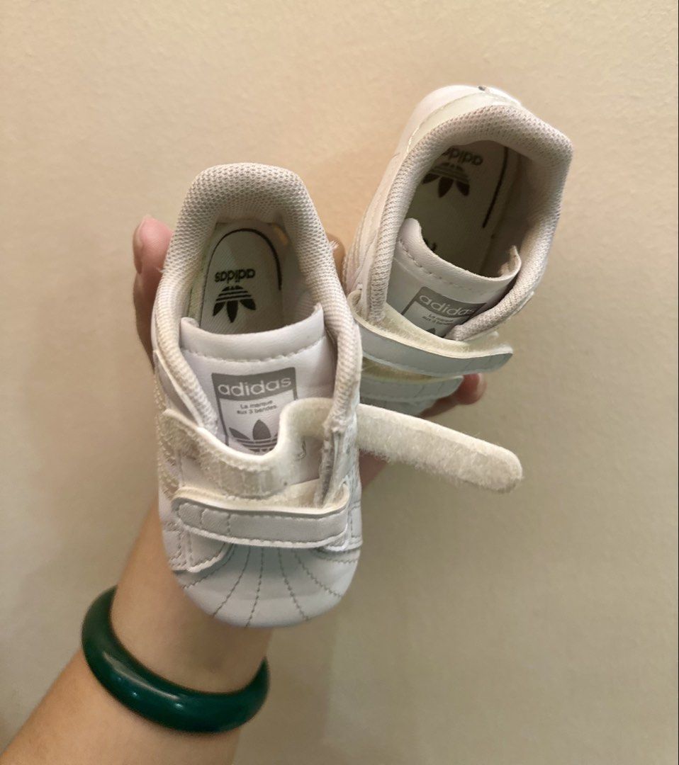 Adidas Superstar Crib (Category: Babies & Kids Fashion) located in Cavite. Submitted by art_declutter (Listing ID 1469975649, Image 1). Description: Size 2k with box.
